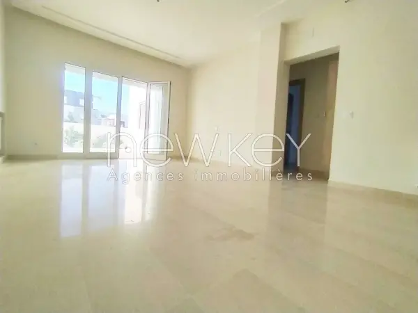 Un Appartement S+2 Neuf avec un grand jardin à La Soukra