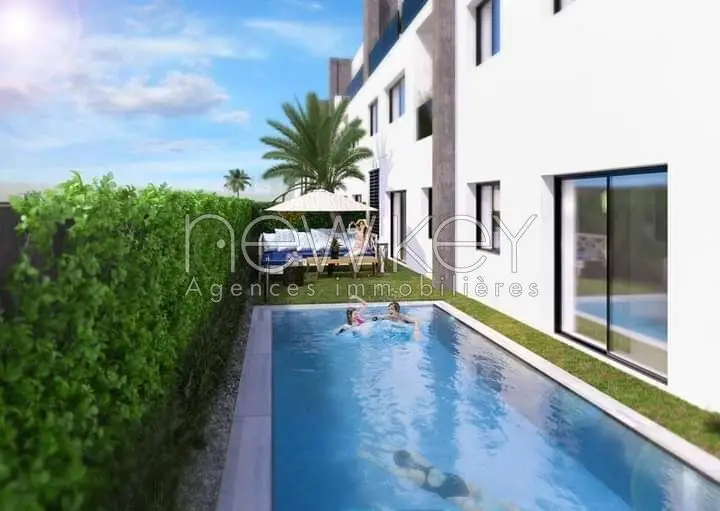 Un Appartement S+3 avec piscine à vendre à La Soukra