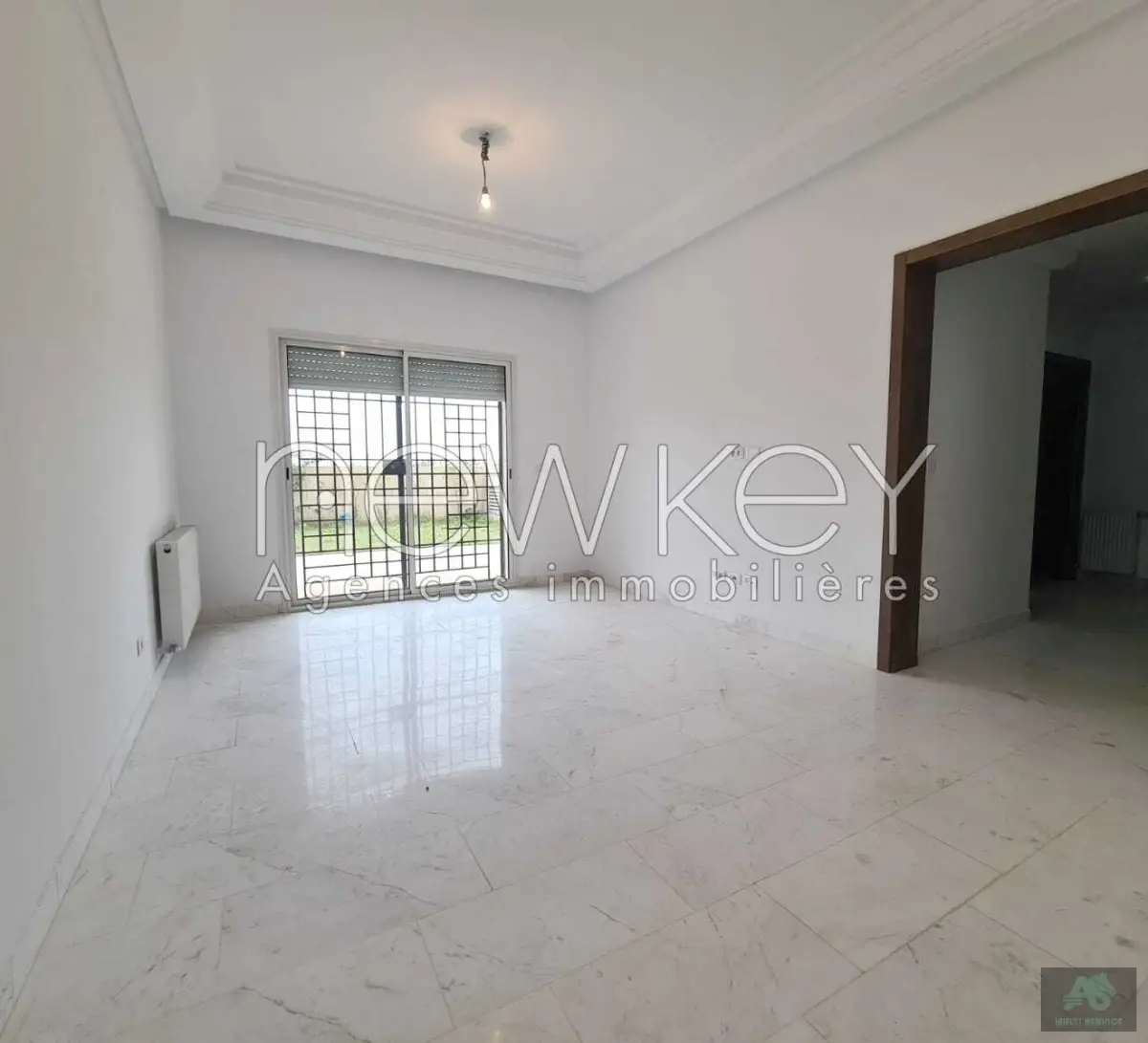 Un Appartement Neuf S+2 avec jardin à La Nouvelle Soukra