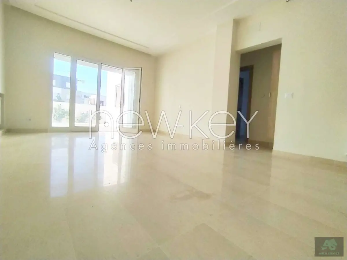 Un Appartement S+2 Neuf avec un grand jardin à La Soukra