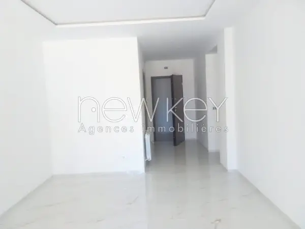 Un Appartement S+2 avec jardin à La Nouvelle Soukra - 1