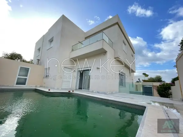 Villa moderne avec piscine et jardin à louer aux Berges du Lac 2
