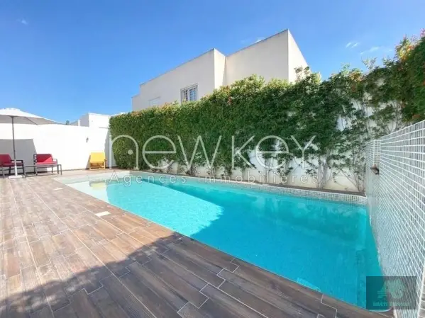Villa moderne avec piscine et jardin à louer au Lac 2
