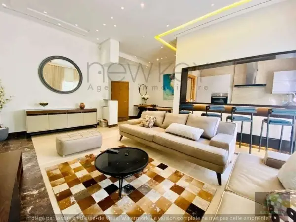 Appartement S 1 moderne richement meublé à louer au Berge du Lac 2